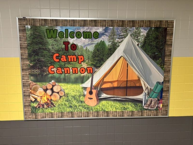 Ms. Cannon's bulletin board invites her class to Camp Cannon on her bulletin board