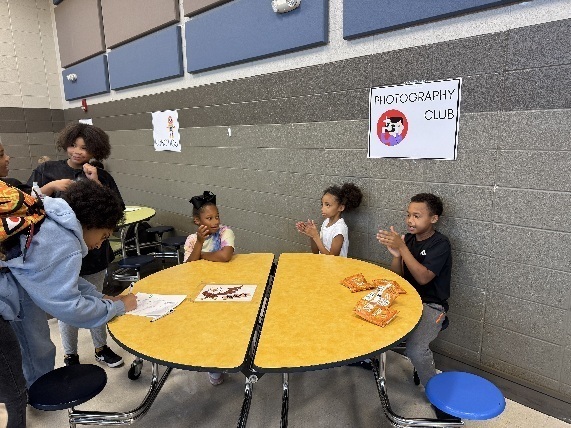 Students sign up for the Photography Club