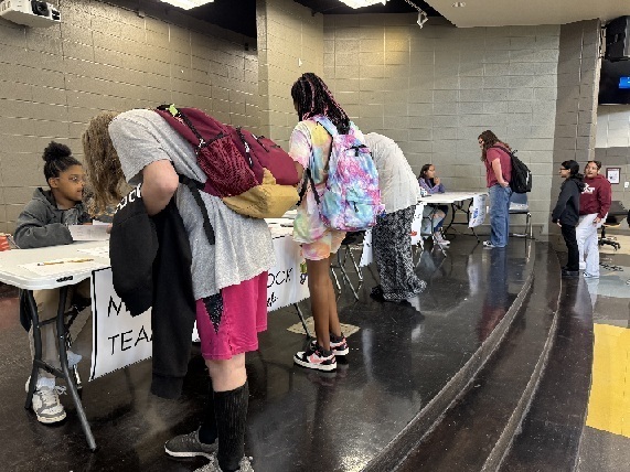 Students sign up for the Math Team and Book Club