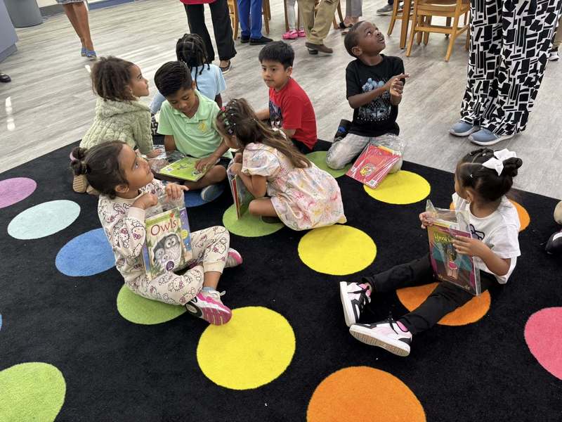 Kindergarten students with their chosen books