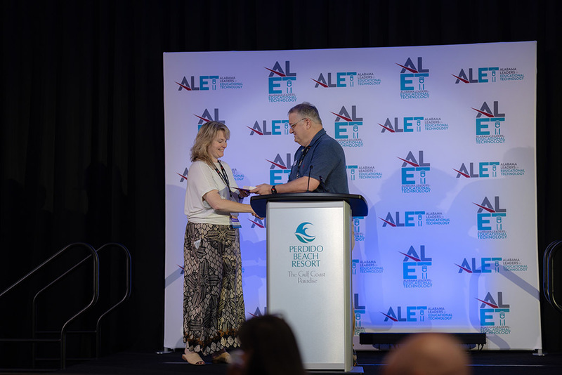 Emily Elam receiving the Sally Moore award