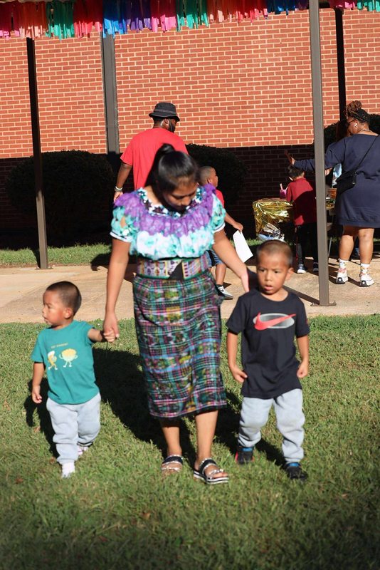 A family enjoying the celebration .