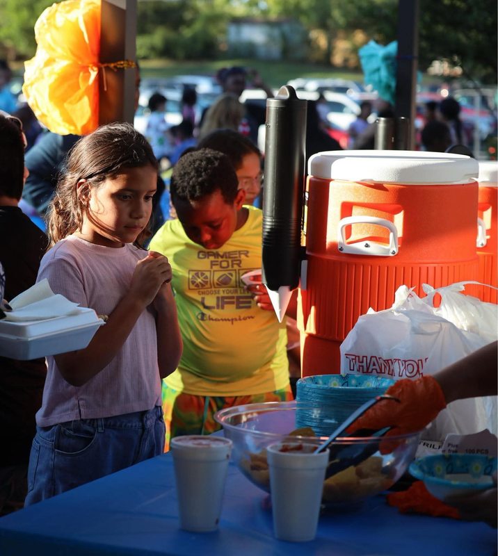Students at the chips, salsa and water table.