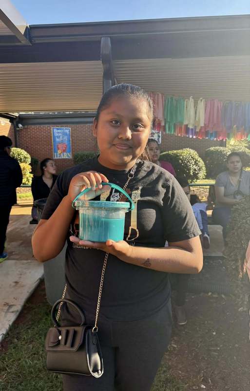 Fourth grader who won a bucket of slime in Loteria.