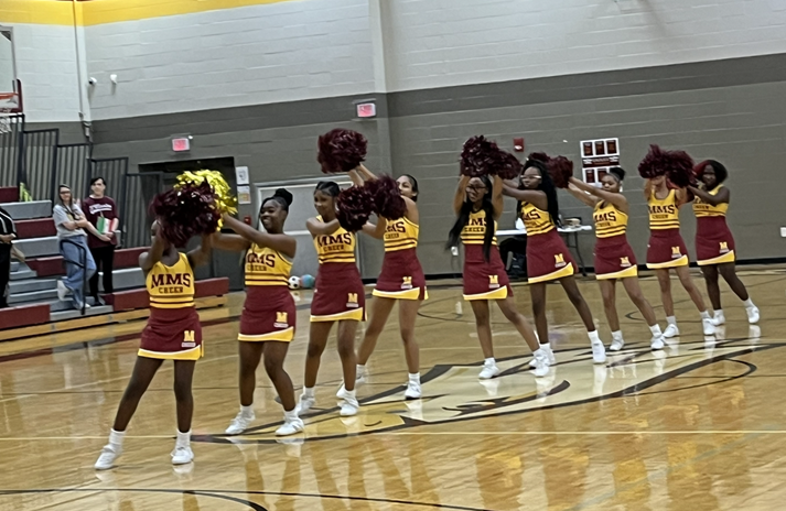 MMS Cheerleaders form a Conga line