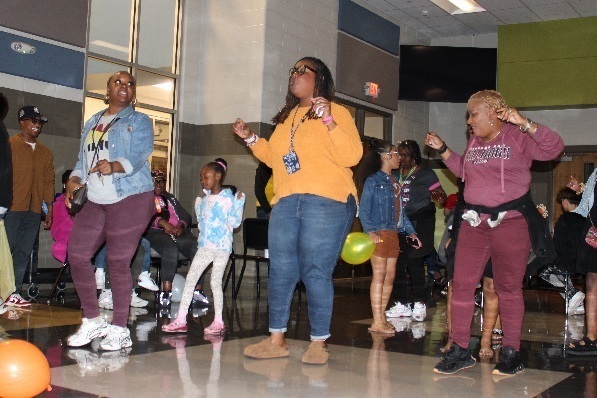 Teacher show students how it's done