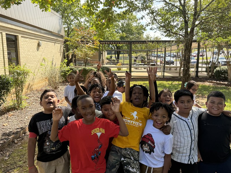 Third grade students posing for a picture.