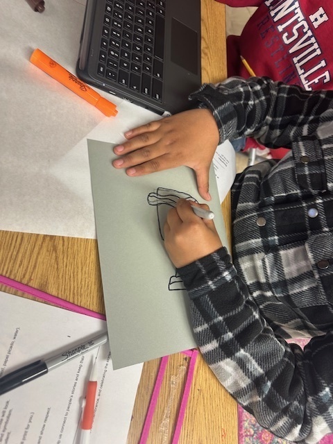 GATE student drawing an item for the ofrenda.