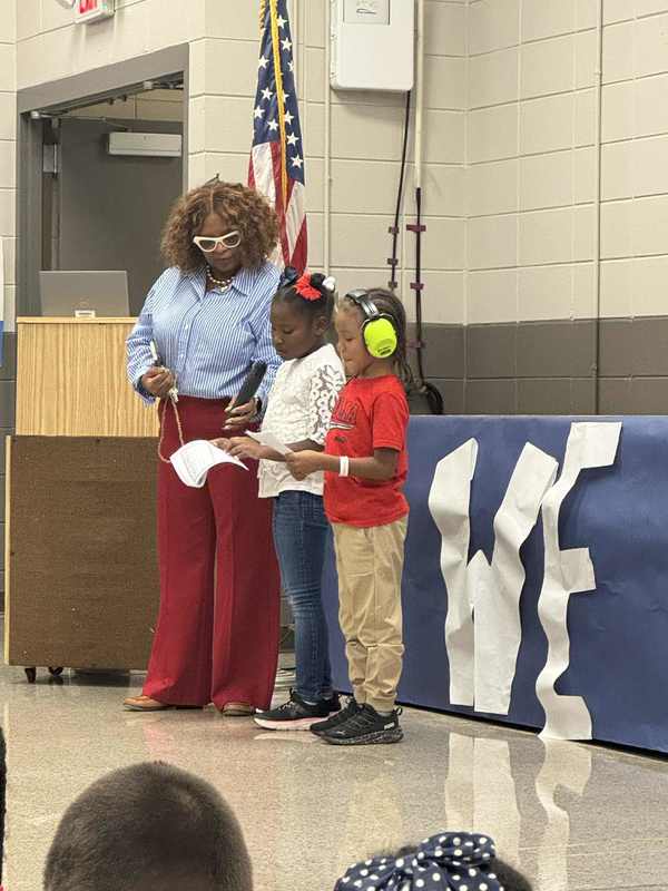 Lyric and Ivan are reading what it means to be a veteran.