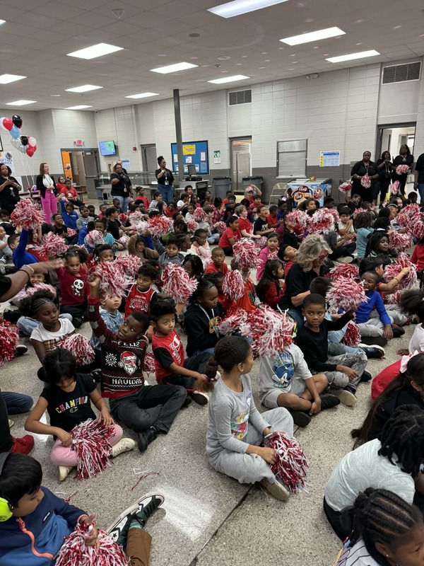 Students received pompoms to show their support.