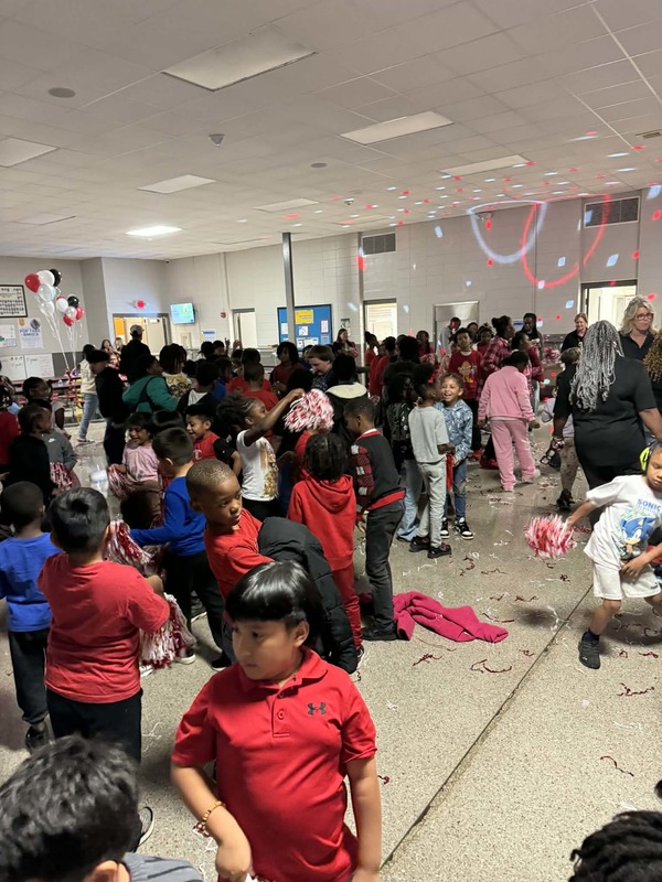 The students dancing at the dance party.