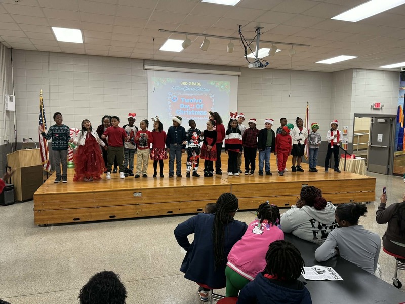 The amazing third graders performing "The 12 Days of Christmas."