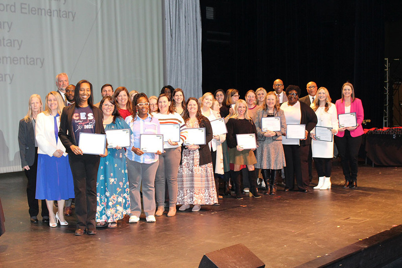 Teachers earning National Board Certification being recognized on stage at Galaxy Awards Night 2026