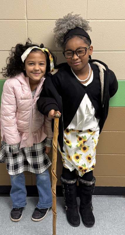 3rd graders, Mary and Eryn dressed up like they are 100 years old.