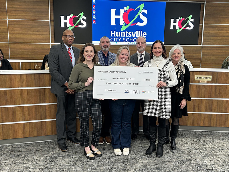 Morris  admin team and Dr. Sutton receive check from TVA