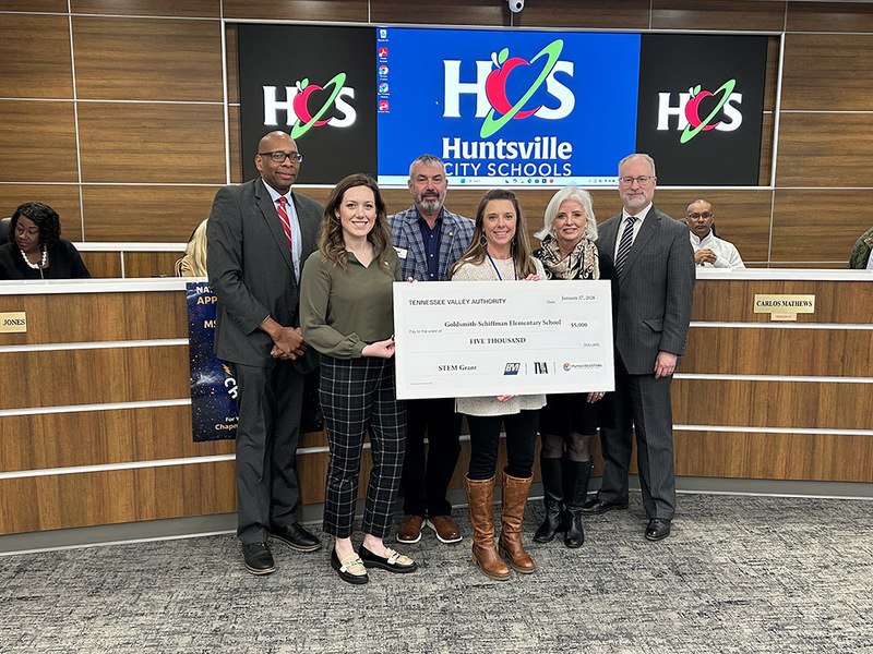 Goldsmith-Schiffman  admin team and Dr. Sutton receive check from TVA