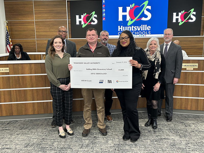 Rolling Hills  admin team and Dr. Sutton receive check from TVA