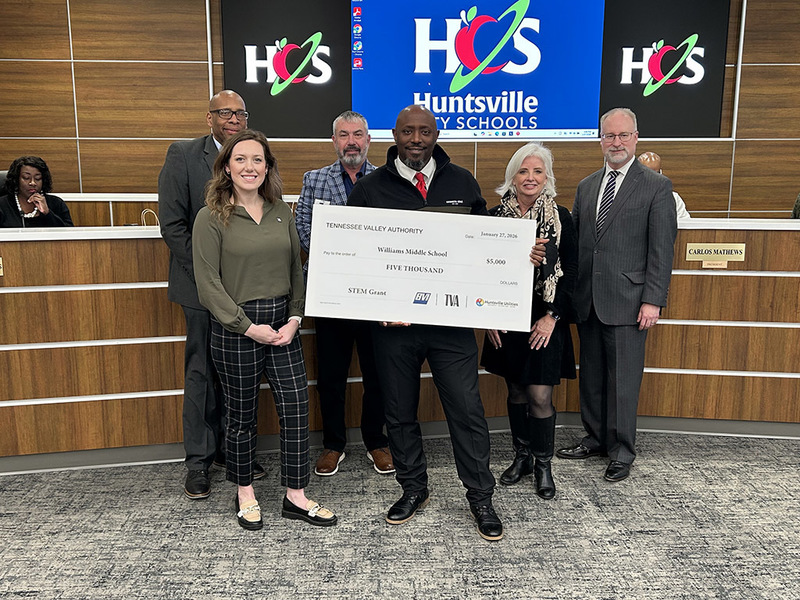 Williams Middle  admin team and Dr. Sutton receive check from TVA