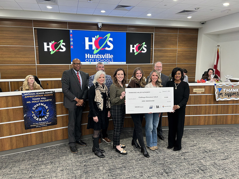 Challenger Elementary  admin team and Dr. Sutton receive check from TVA