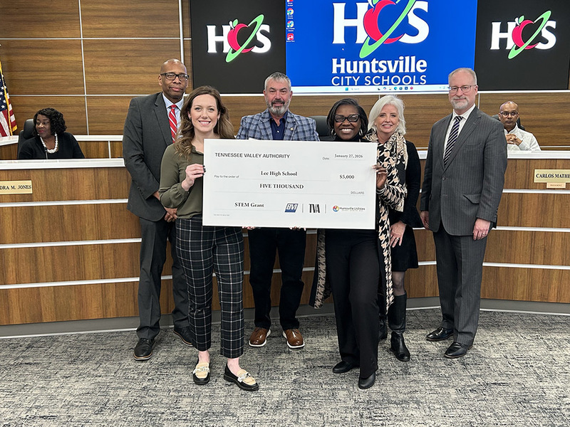 Lee High School  admin team and Dr. Sutton receive check from TVA