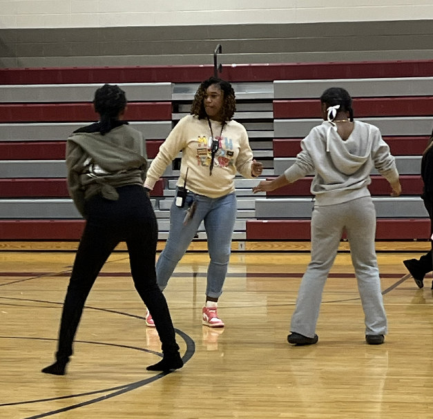Mrs. Elike joins students on the dancefloor