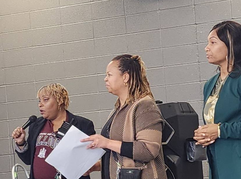 Dr. Burruss, Mrs. Stallworth-Brown and Mrs. Lattimore present certificates of achievement