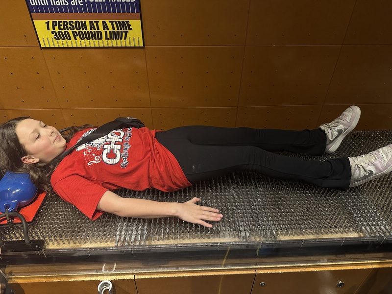 doing a science experiment at the science center