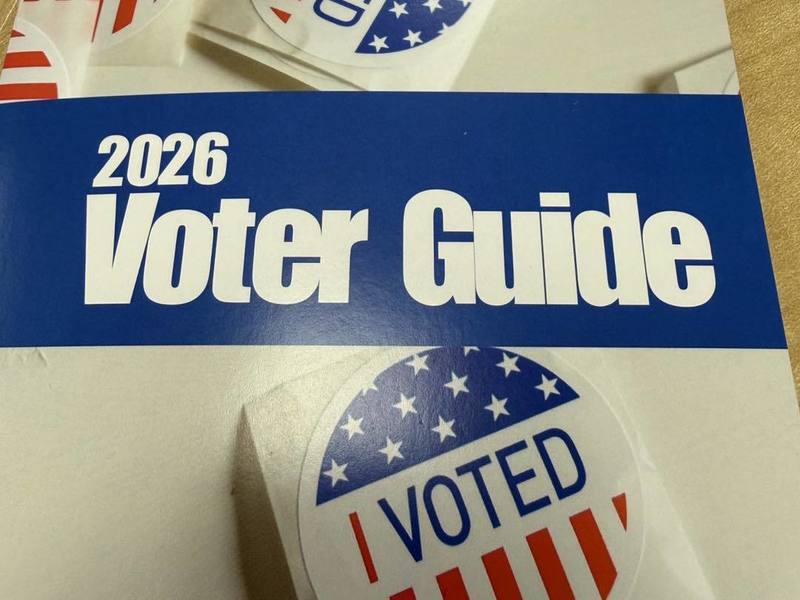 2026 Voter Guide with I Voted sign in red, white and blue