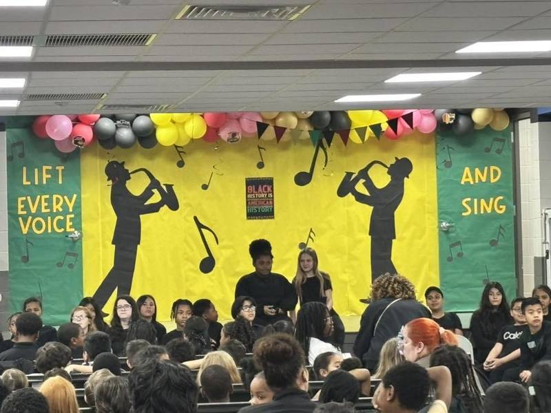 Fifth graders Keziah and Stephanie hosted the show from the cafeteria stage