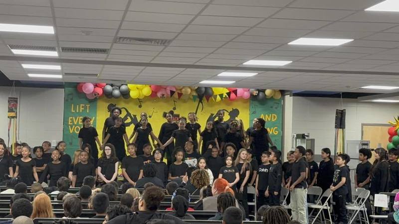 Dancers and students singing the final song. 