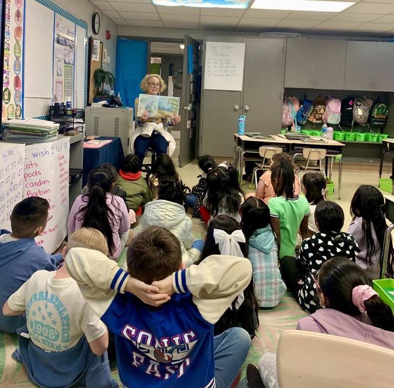 Guest reader reading to a class