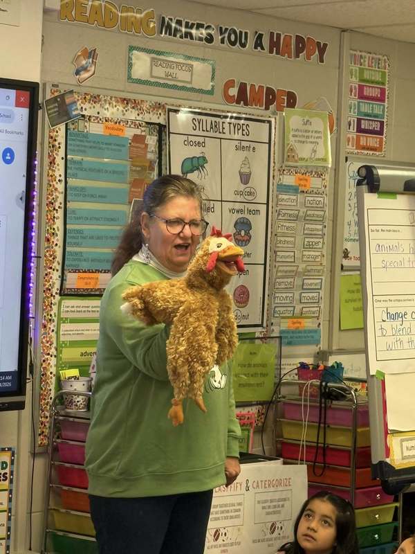 Retired teacher, DKG member and puppet maker visited a class with her book and a homemade puppet