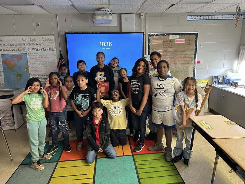Columbia High School student with Ms. Legg's third grade class