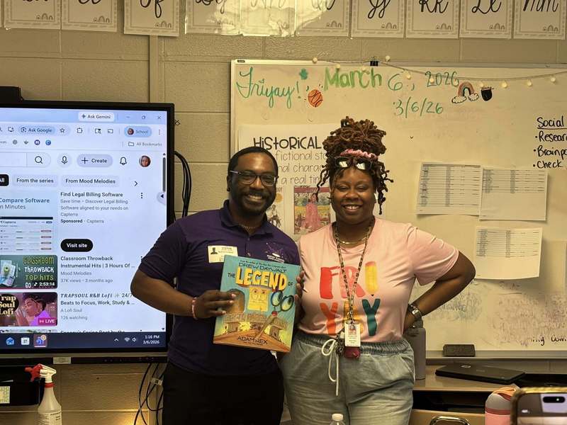 Guest reader and Ms. Toney after he read a funny book to her class