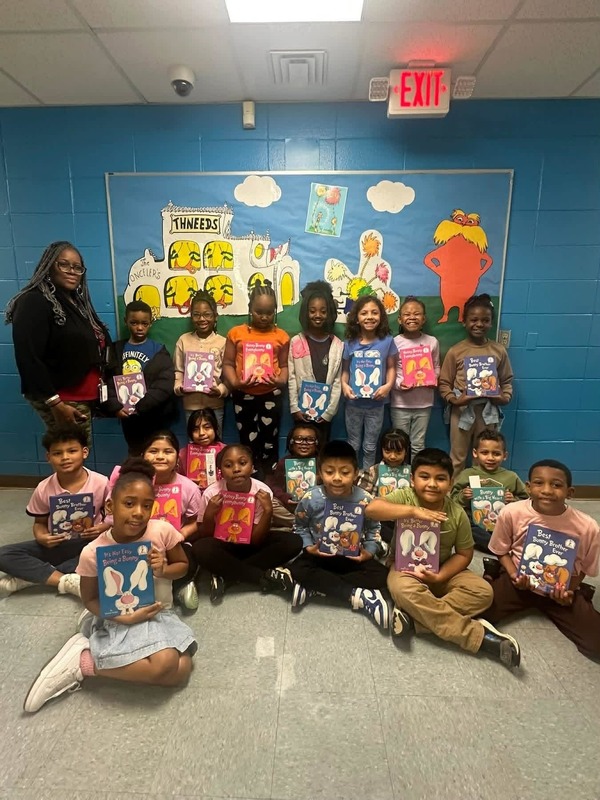 Mrs. Branch-Robinson's Second Grade Class with their Dr. Seuss books.