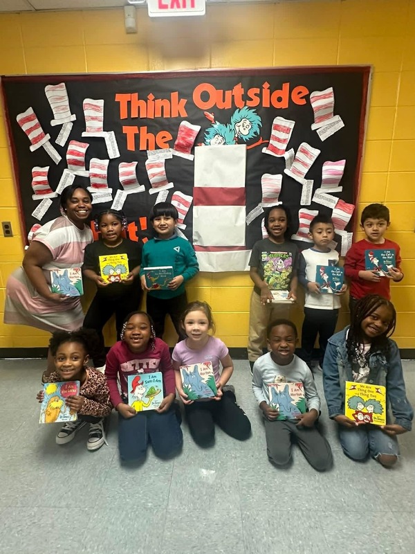 Mrs. Daniel's Kindergarten Class showing their Dr. Seuss board books.