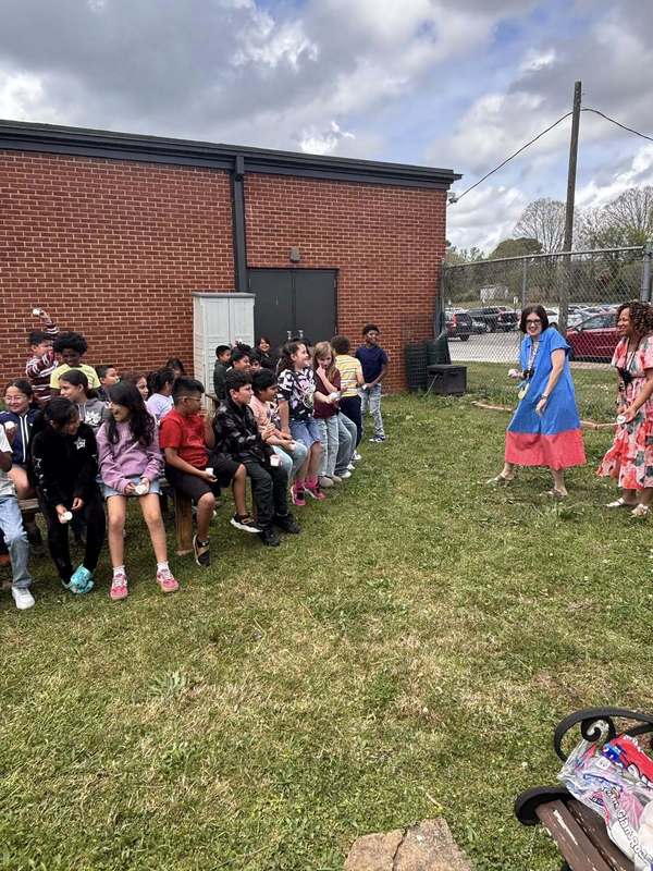 Mrs. Barksdale and Mrs. Johnson teaching their class about the Lirpa Loof