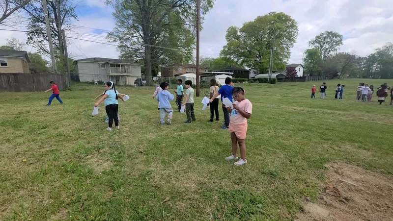 Mrs. Dodson's class flapping arms and calling for the Sloof Lirpa.