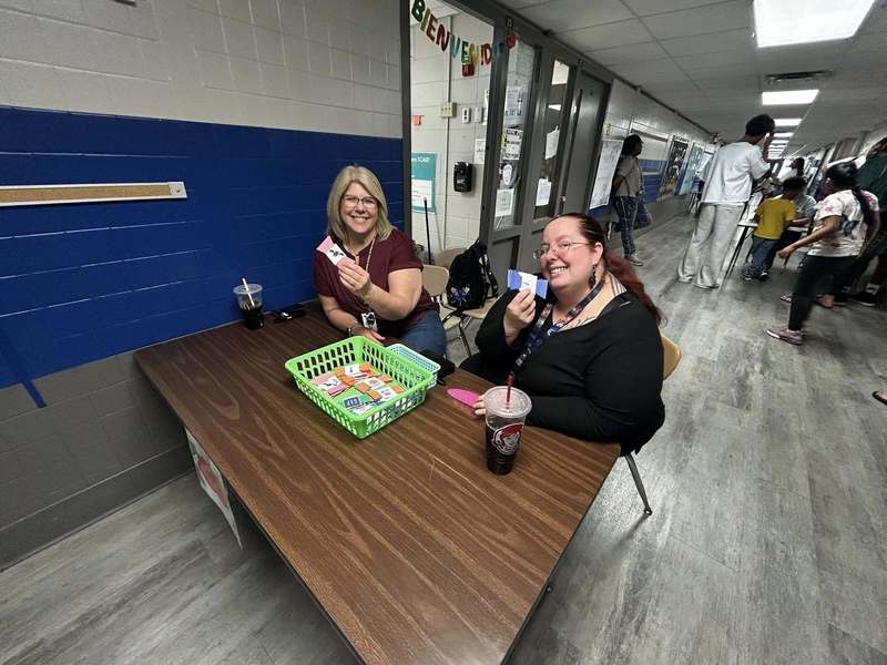 Mrs. Cannon and Ms. Measom representing Kindergarten at the literacy stations