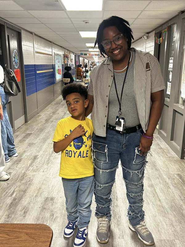 Ms. Perris Forde-Clark and a student enjoying Family Fun Night