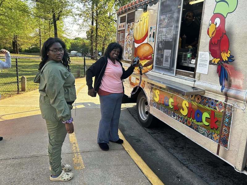 Families enjoying the Snack Shack food truck