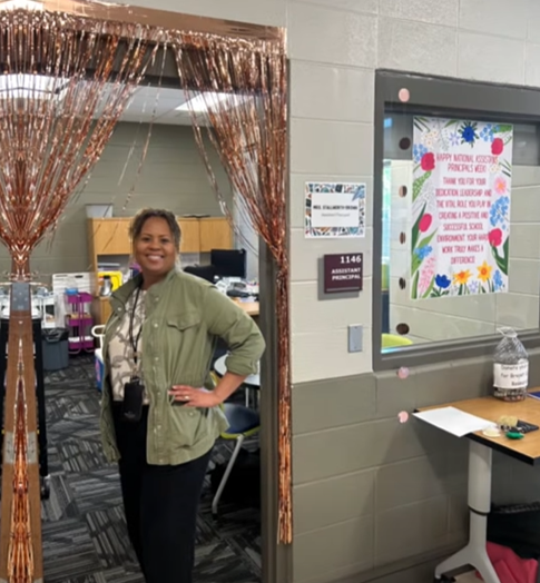 Mrs. Stallworth-Brown poses in her decorated doorway