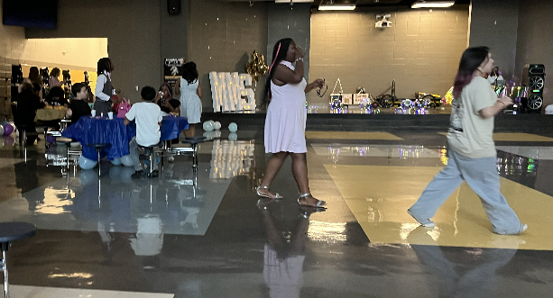 Some students enjoy a chat while others  start up a line dance. 
