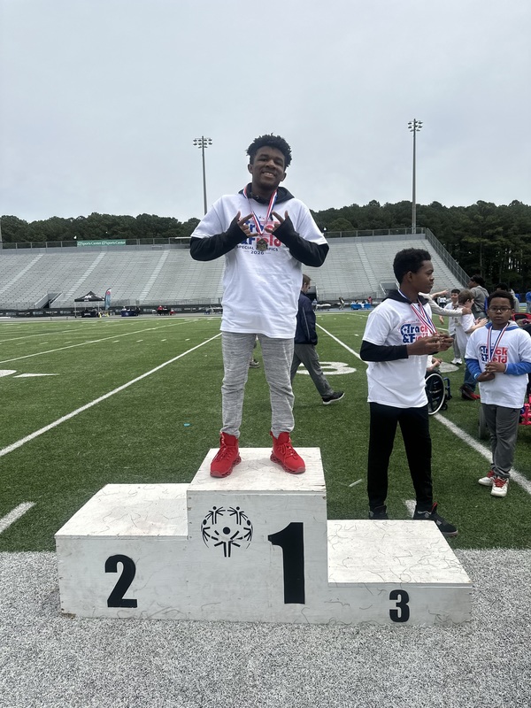 Chad on the podium for winning the 200 m