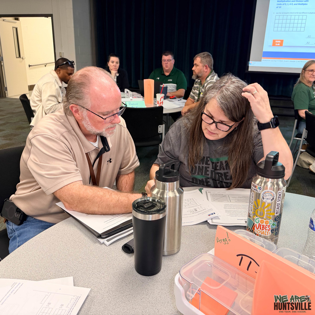 Two teachers solving a problem