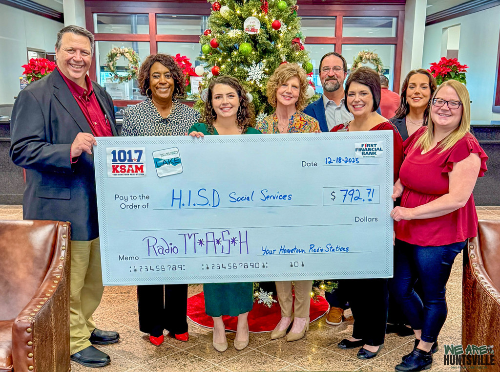 Group holding Big Check