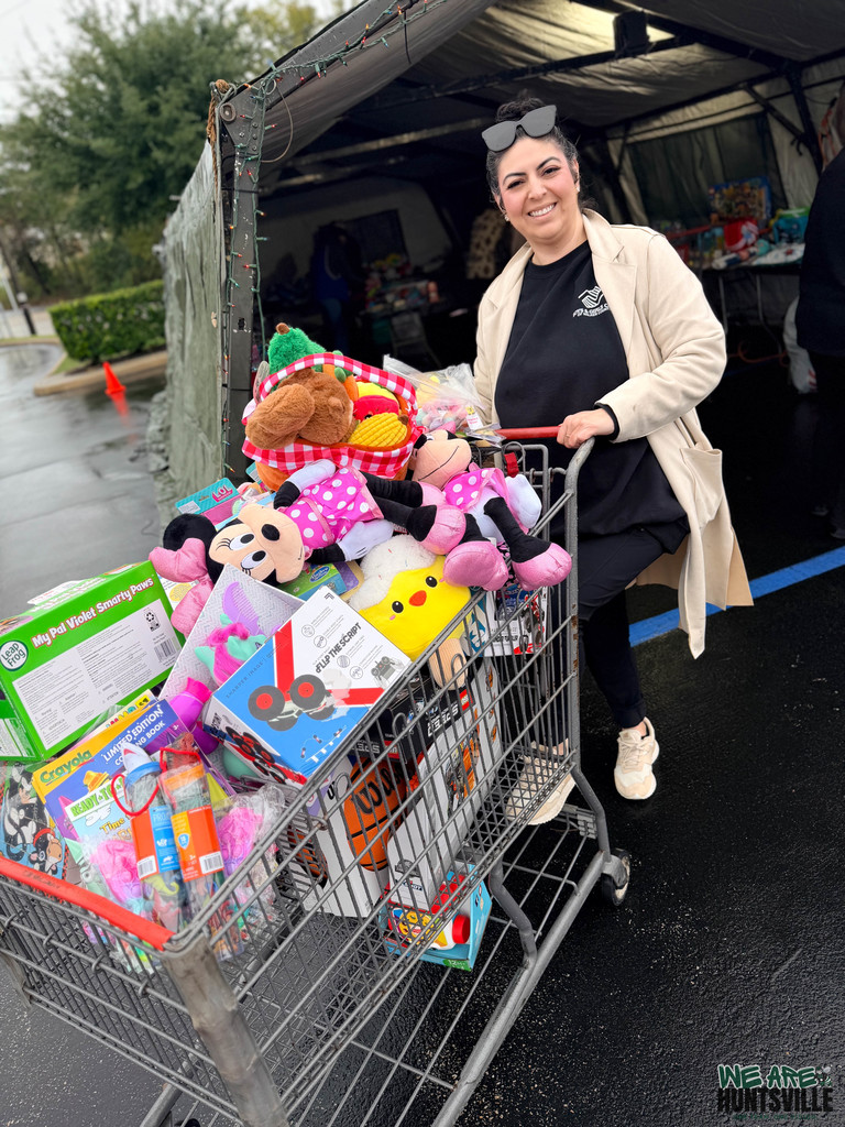 Walker County Boys and Girls Club Employee with toys