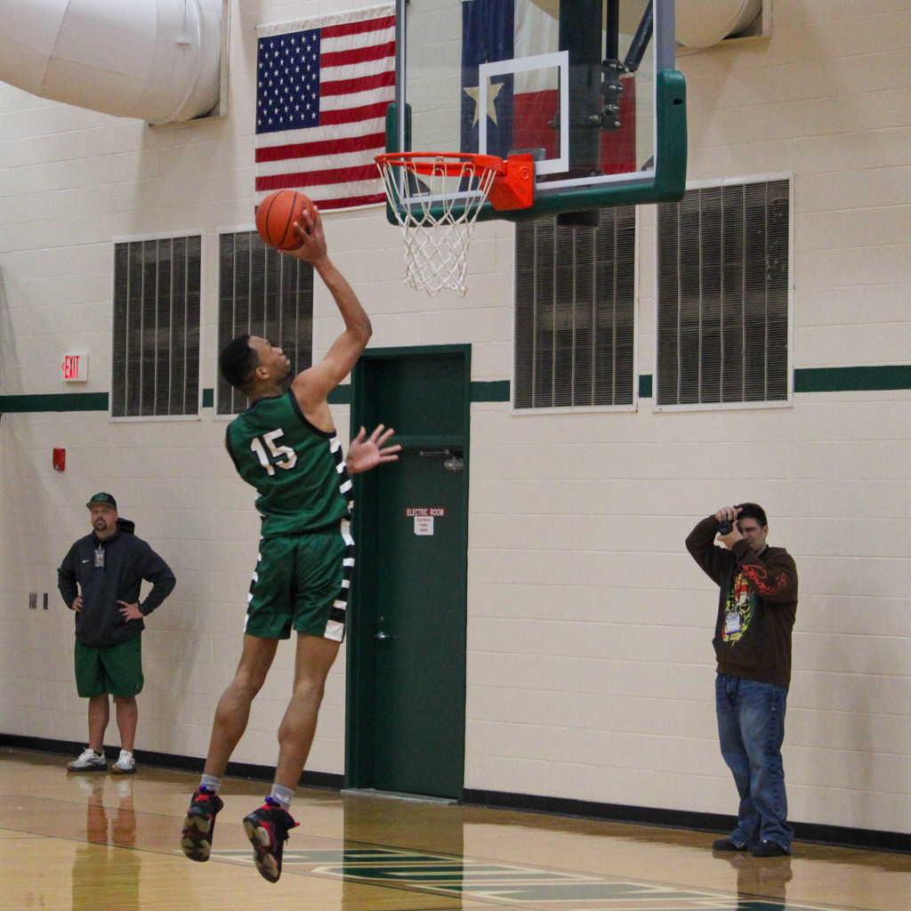 boy goes up for uncontested lay up