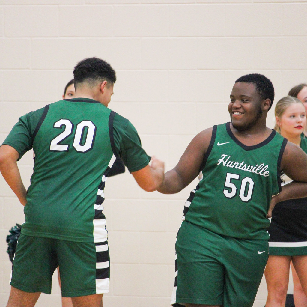team mates giving each other high fives