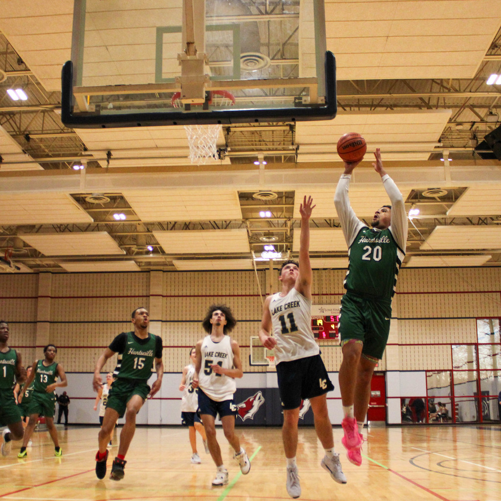 Student goes up for a lay up